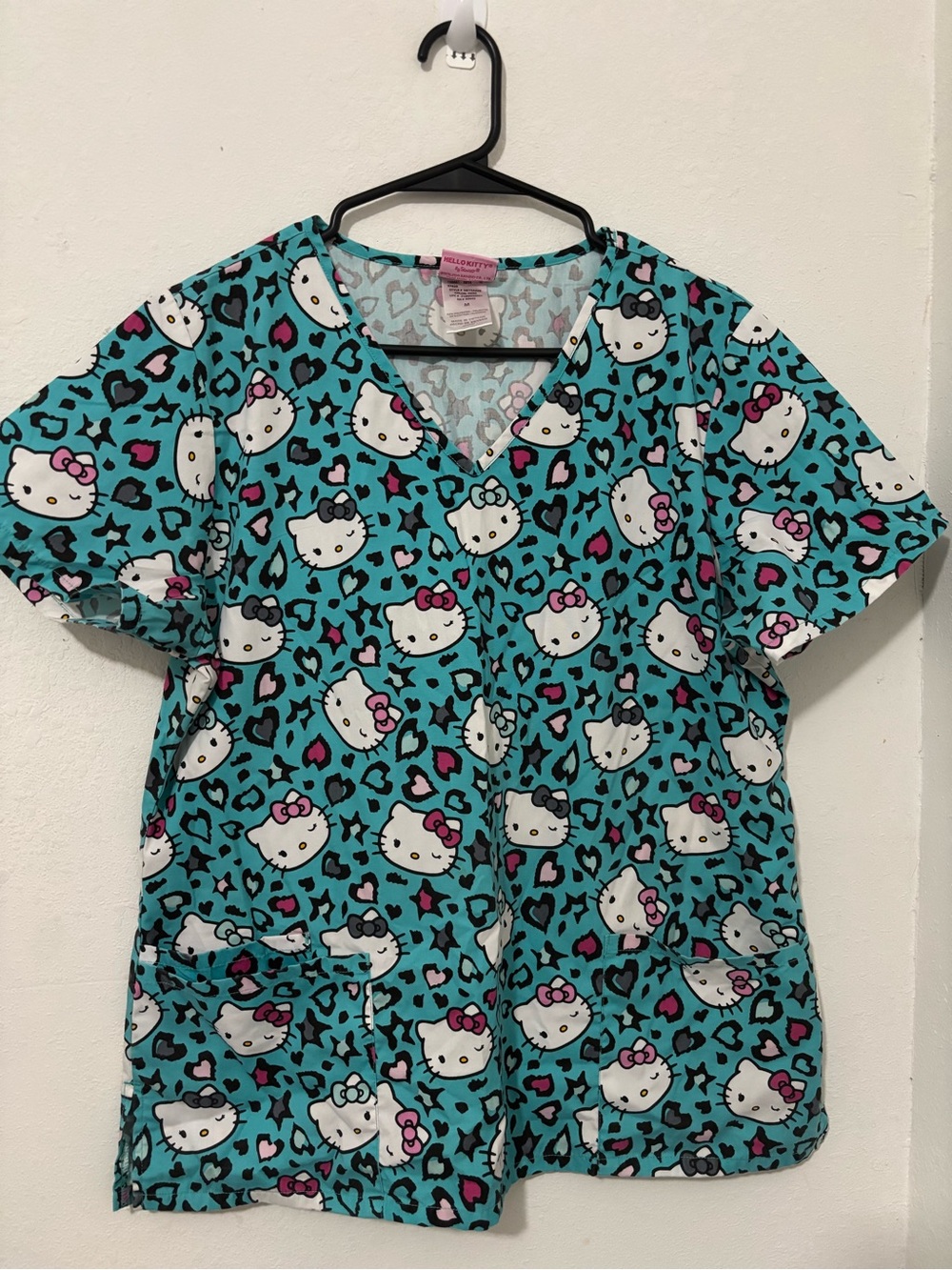 Hello Kitty Aqua V-Neck Scrub Top with Pink Bow Accents